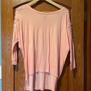 Womens top with cute details on shoulder